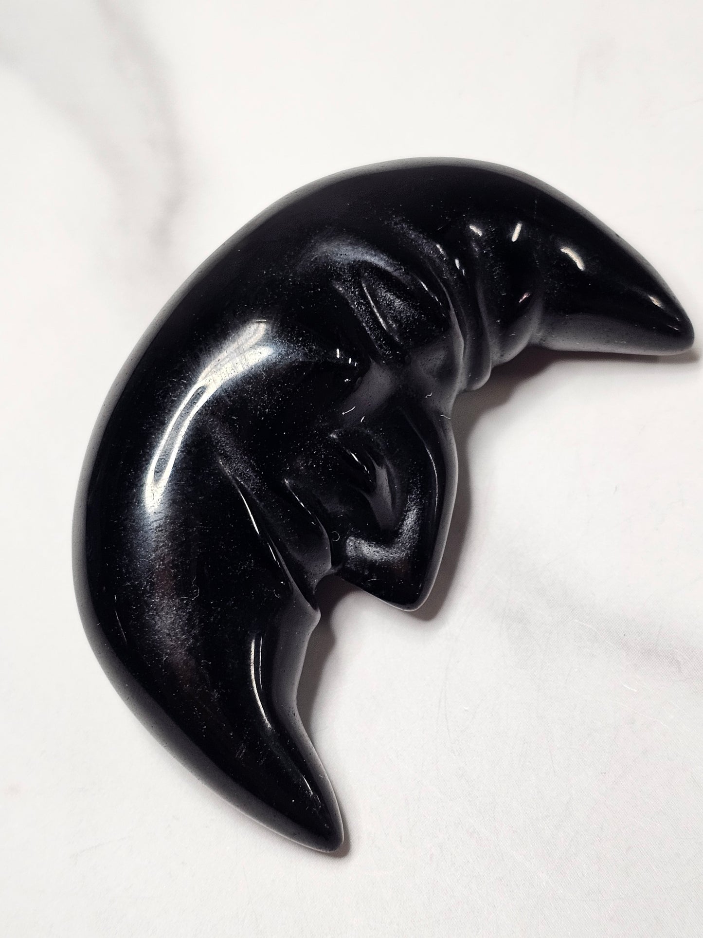 Crystal Moon with Face Carving