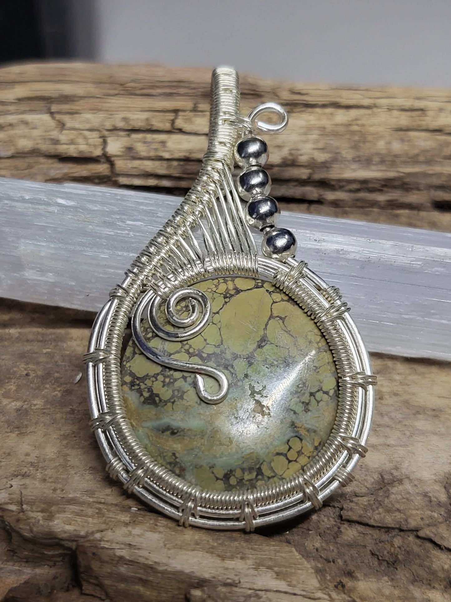Fossilized Palm Root and Silver Wire Wrapped Pendant Necklace