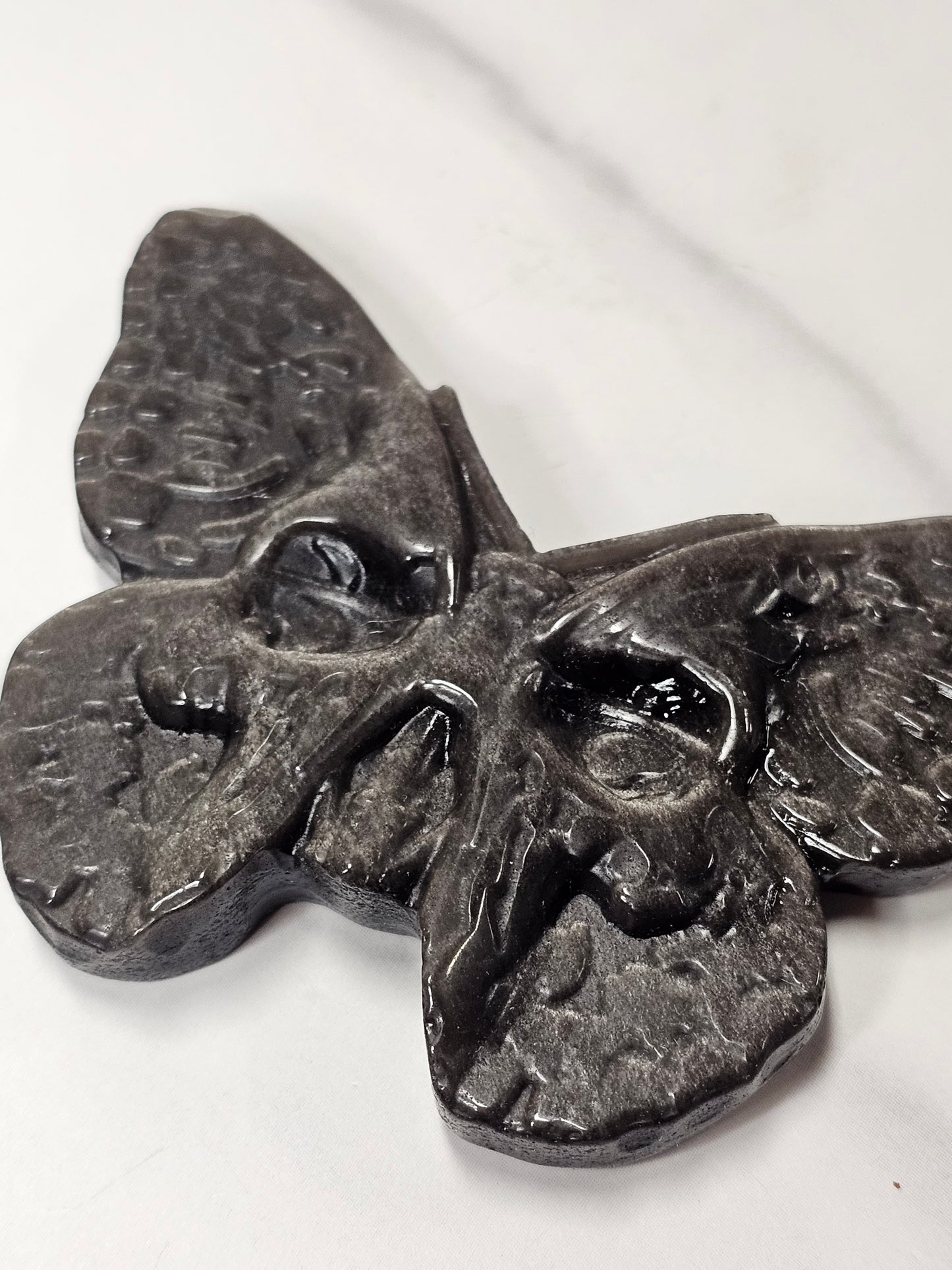 Silver Sheen Obsidian Butterfly Skull Carving