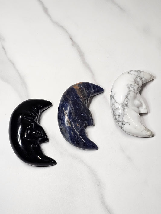 Crystal Moon with Face Carving