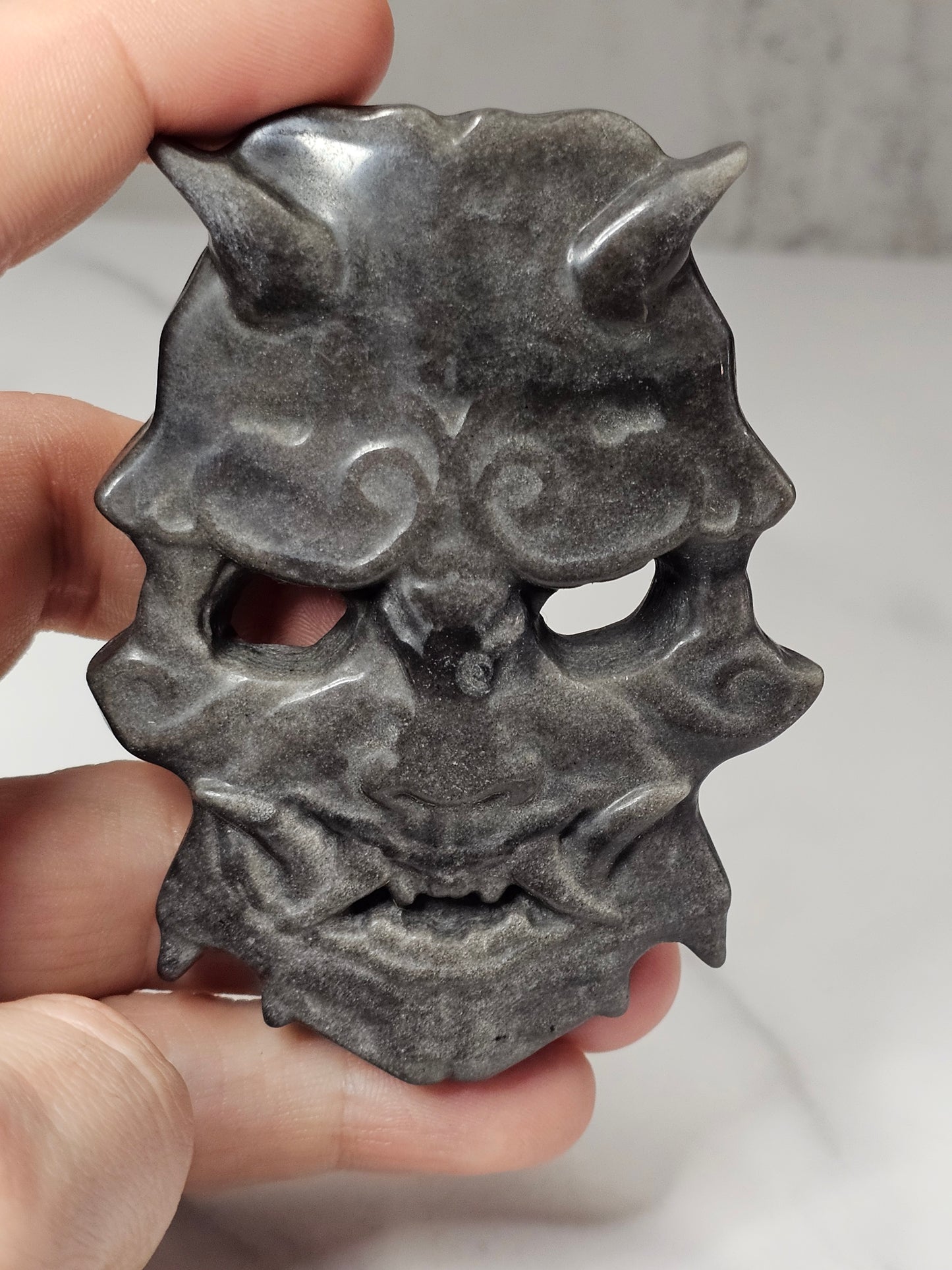 Silver Sheen Obsidian Mask Carving