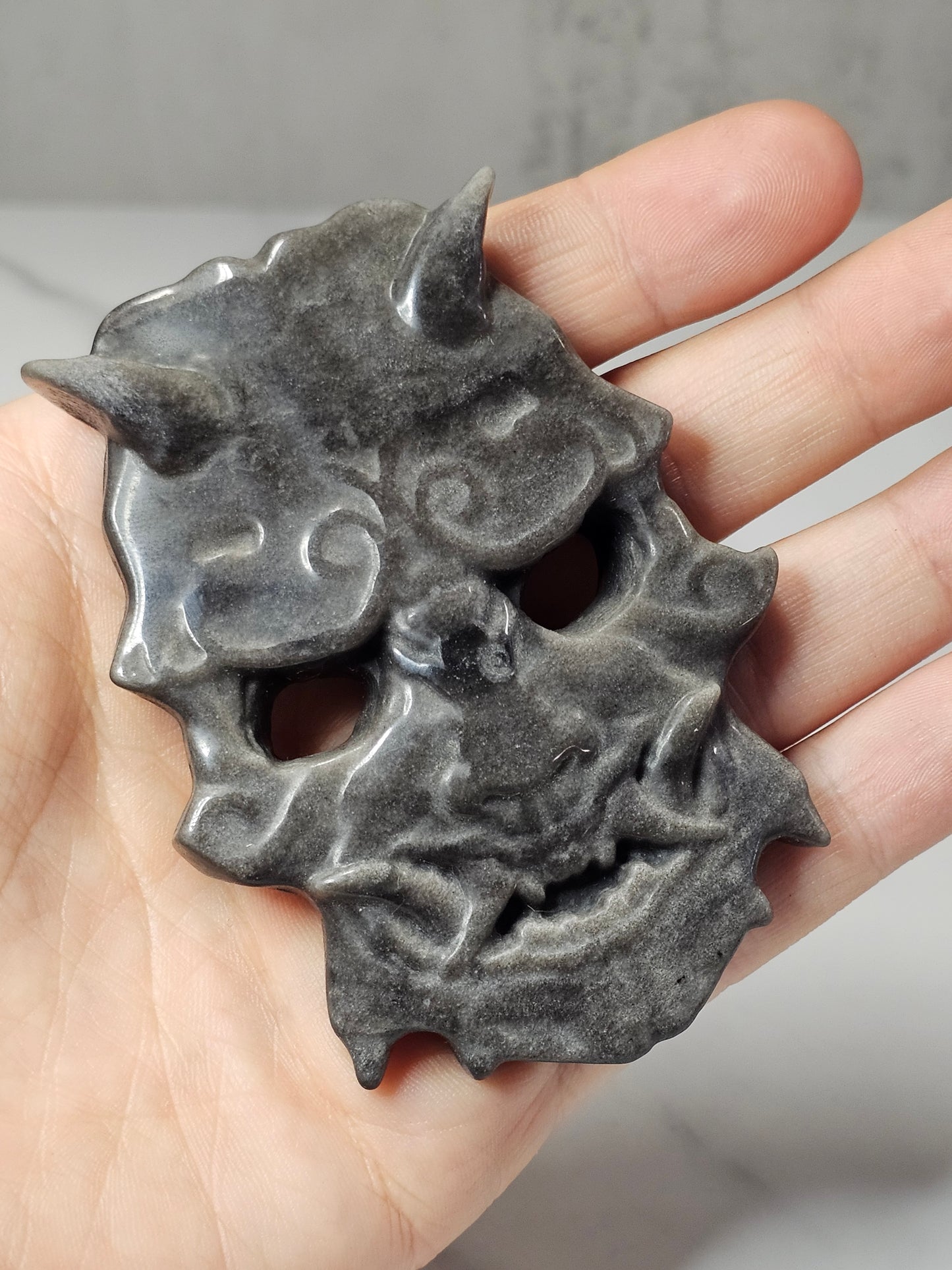 Silver Sheen Obsidian Mask Carving