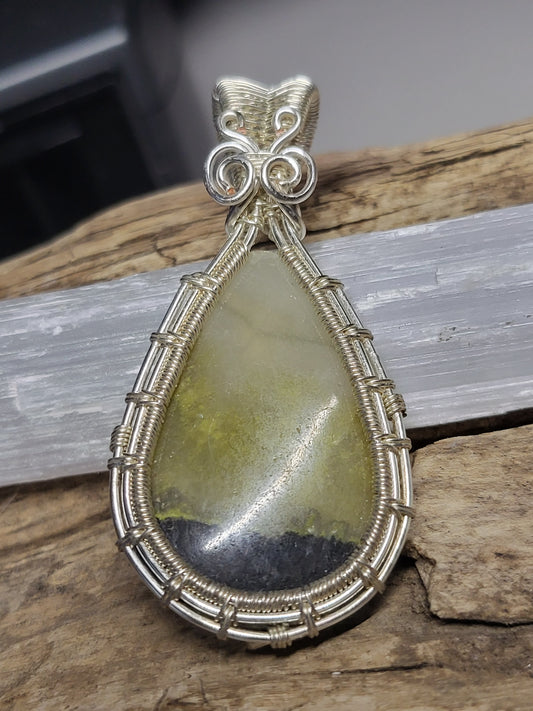 Fossilized Palm Root and Silver Wire Wrapped Pendant Necklace